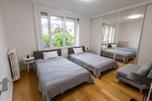 2 chambres, fer et planche à repasser, Wi-Fi, draps fournis