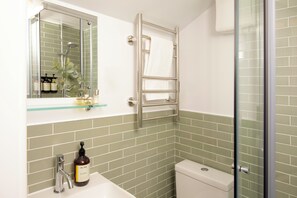 Hair dryer, towels, soap, shampoo