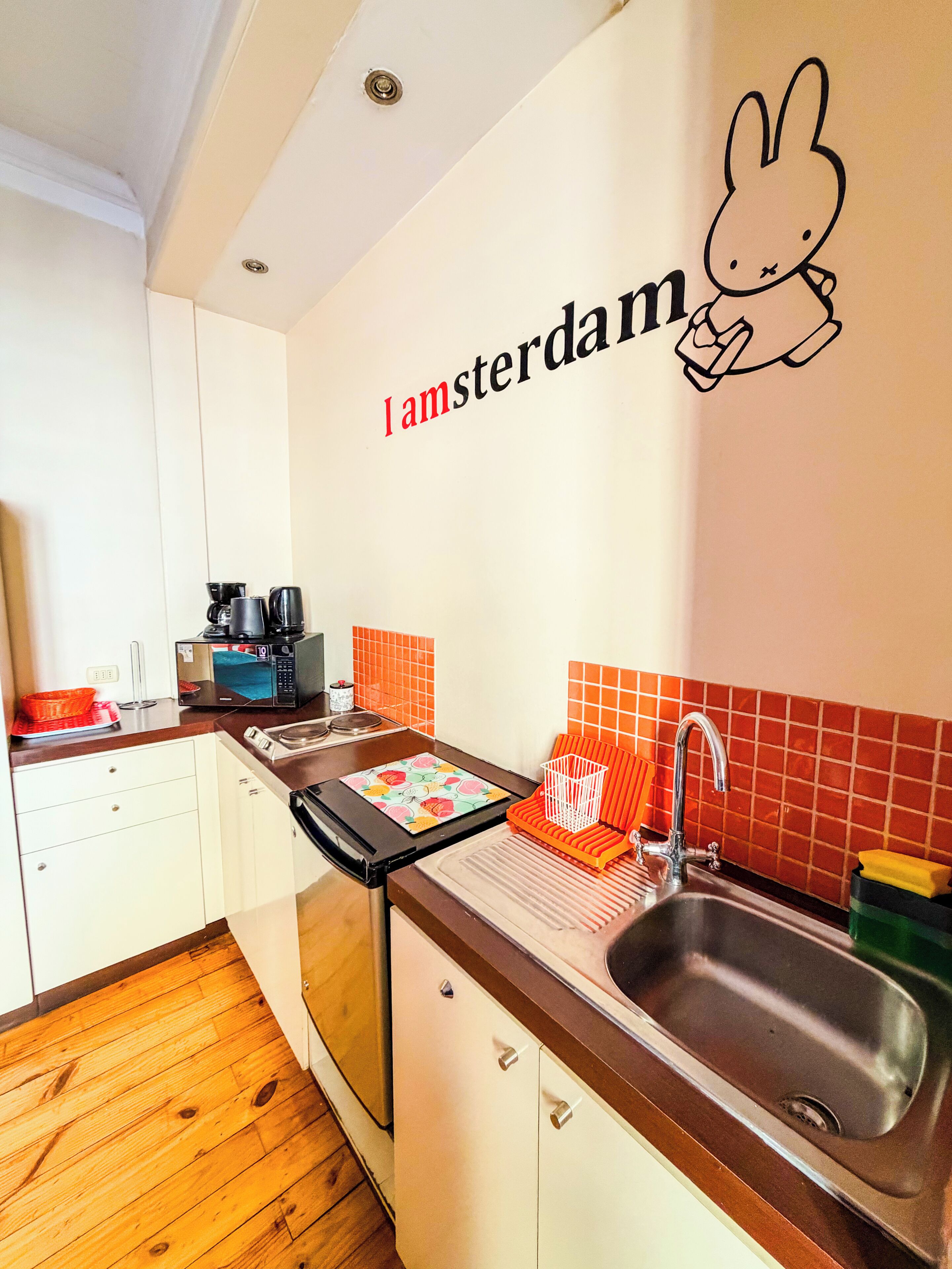 Family Studio Suite, Multiple Beds, Non Smoking | Private kitchen | Mini-fridge, microwave, stovetop, dishwasher