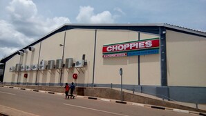A large building with a sign reading "CHOPPIES SUPERSTORES" and "VALUE FOR YOUR MONEY". - This 4 bed 3 full bath a big living room, nice kitchen located in Chililabombwe  (Chililabombwe)
