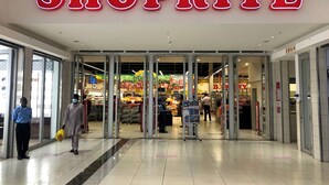 A shopping mall entrance with a prominent 'SHOPRITE' sign. - This 4 bed 3 full bath a big living room, nice kitchen located in Chililabombwe  (Chililabombwe)