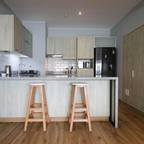 Departamento | 2 habitaciones, tabla de planchar con plancha y internet