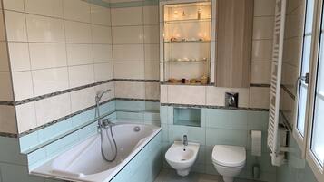 Hair dryer, bidet, towels, soap