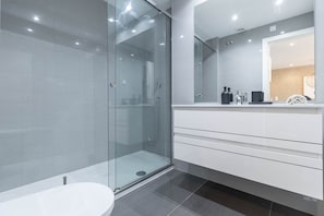 Shower, hair dryer, towels, soap