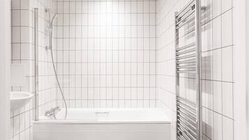 Shower, deep-soaking bathtub, towels