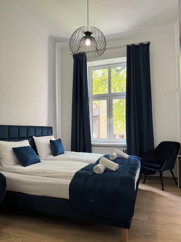 Hypo-allergenic bedding, pillow-top beds, laptop workspace