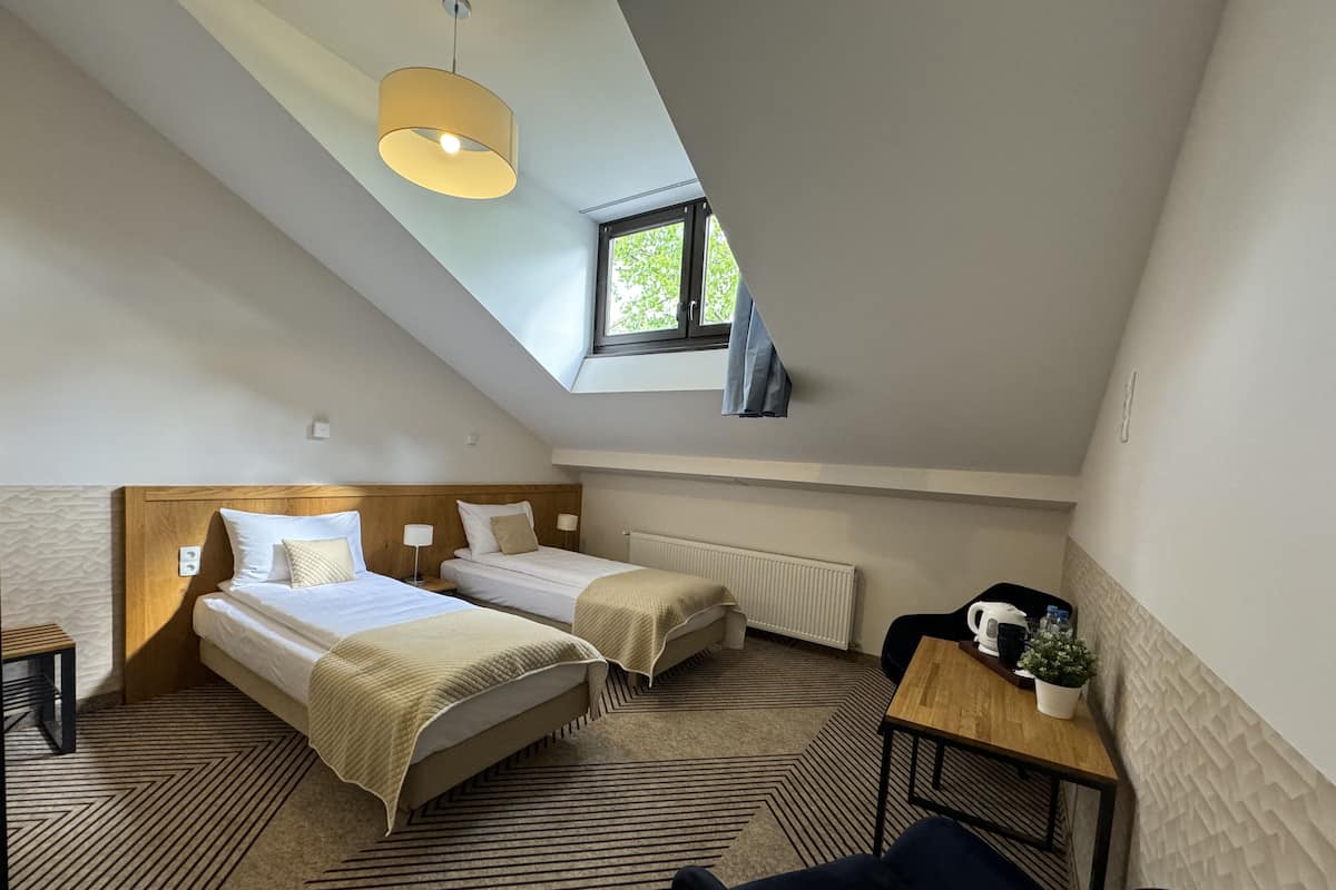 Hypo-allergenic bedding, pillow-top beds, laptop workspace