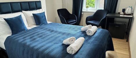 Hypo-allergenic bedding, pillow-top beds, laptop workspace