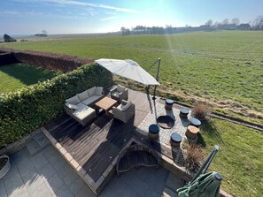 Outdoor dining - Schwalbennest - vacation with the whole family - 450m to the sea - unobstructed view (Brodersby)