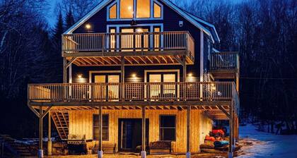Experience Lakeside Living with a Perfect Blend of Rustic Charm & Modern Luxury
