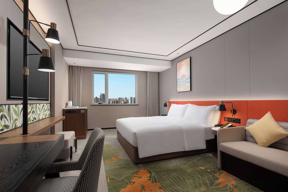 Premium bedding, down duvets, memory-foam beds, in-room safe