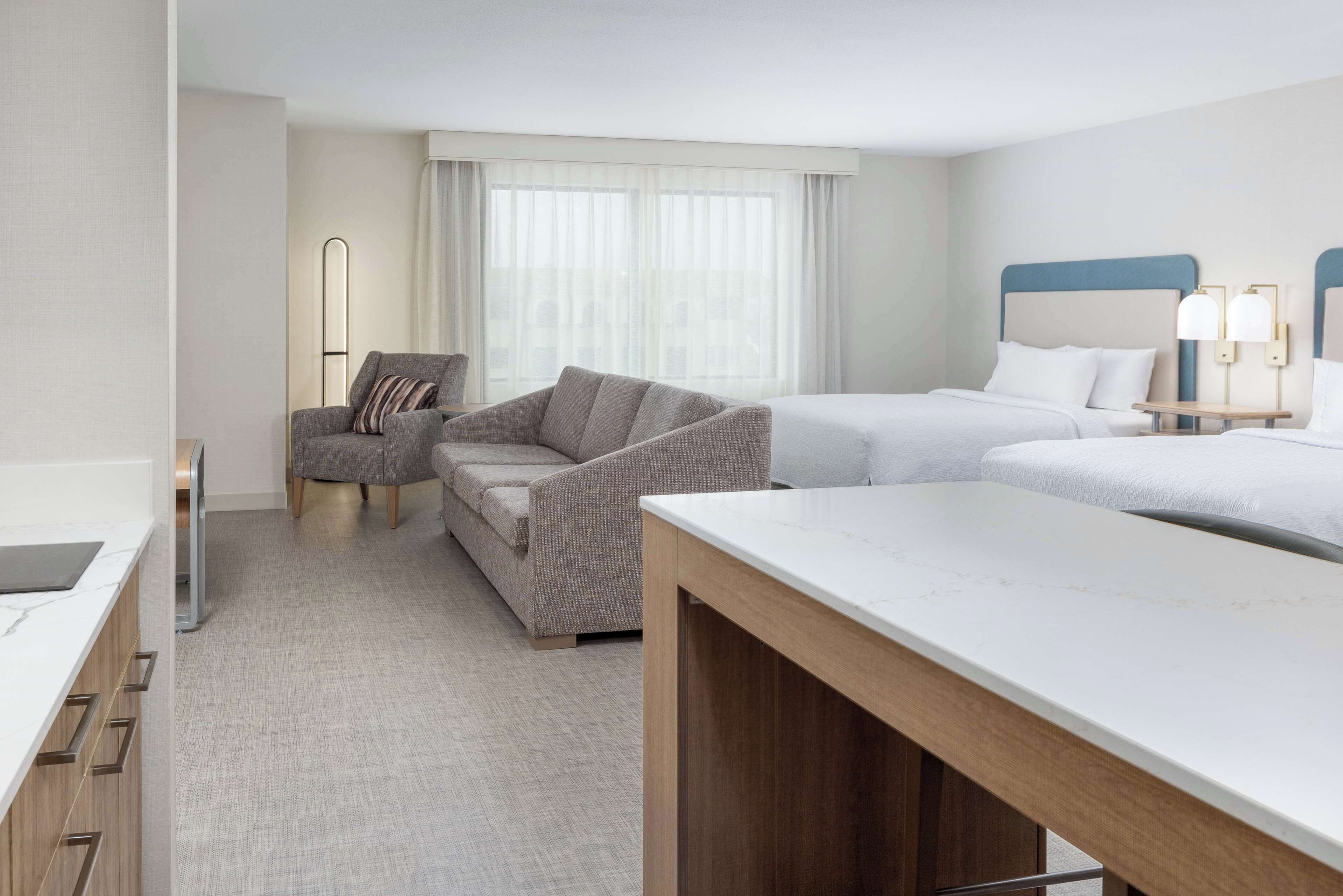 Studio, 2 Queen Beds, Accessible, Bathtub (Hearing) | Living area | 55-inch flat-screen TV with digital channels, Netflix, Hulu