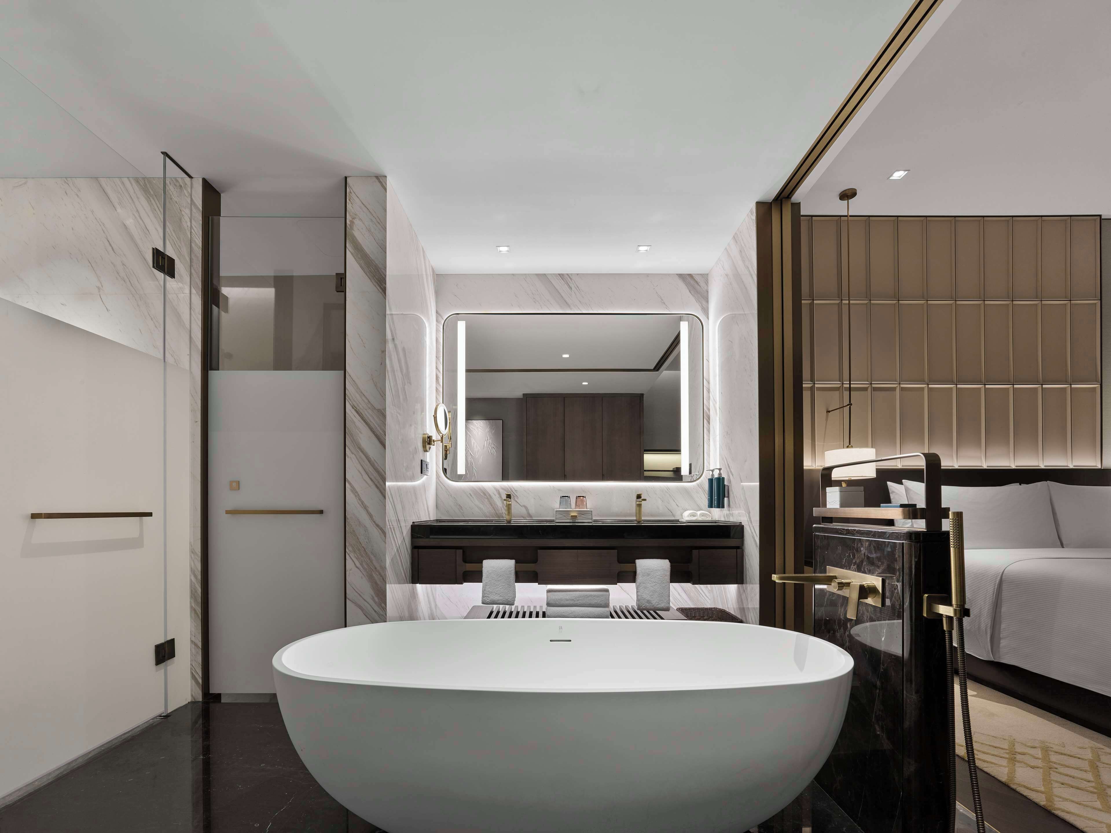 Rainfall showerhead, designer toiletries, hair dryer, bathrobes