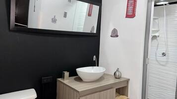 Hair dryer, towels, soap, toilet paper