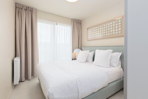 Deluxe Apartment, 2 Bedrooms, Patio, Courtyard View | Premium bedding, down comforters, laptop workspace, soundproofing - Casselbergh Residences Sky Bridge (Ostend)