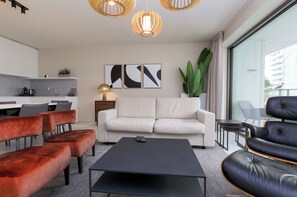 Deluxe Apartment, 2 Bedrooms, Patio, Courtyard View | Living area | 50-inch Smart TV with digital channels - Casselbergh Residences Sky Bridge (Ostend)