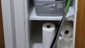 A storage closet with shelves holding towels, a basket, and cleaning supplies. - First floor 1Bed/1Bth Pets OK, Close to ProMedica, UT (Toledo)