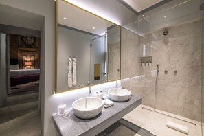 Shower, rainfall showerhead, designer toiletries, hair dryer