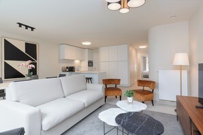 Deluxe Apartment, 2 Bedrooms, Kitchen, City View | Living area | 50-inch Smart TV with digital channels - Casselbergh Residences Kaaiman (Ostend)