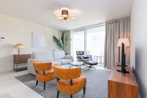 Deluxe Apartment, 2 Bedrooms, Balcony, City View | Living area | 43-inch Smart TV with digital channels - Casselbergh Residences Leader (De Haan)