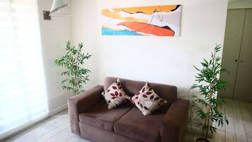 Apartemen | Area keluarga | Smart TV 65-inci dengan saluran TV digital