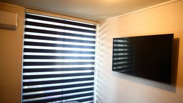 Apartemen | 2 kamar tidur, seprai premium, dan tirai kedap cahaya