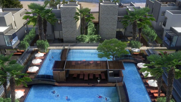A rooftop pool area with a view of the ocean, surrounded by palm trees and modern buildings. - Opera Exclusive Studio (Limassol)