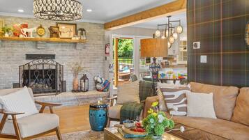 Smart TV, fireplace, table football, books