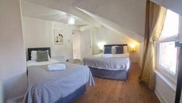 4 bedrooms, desk, iron/ironing board, travel cot