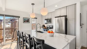 Condo (Woodbridge 34 C) | Private kitchen | Cookware/dishes/utensils