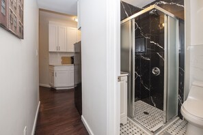 Shower, hair dryer, towels, soap