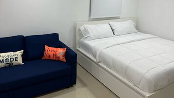 Articles gratuits dans le mini-bar, fer et planche à repasser