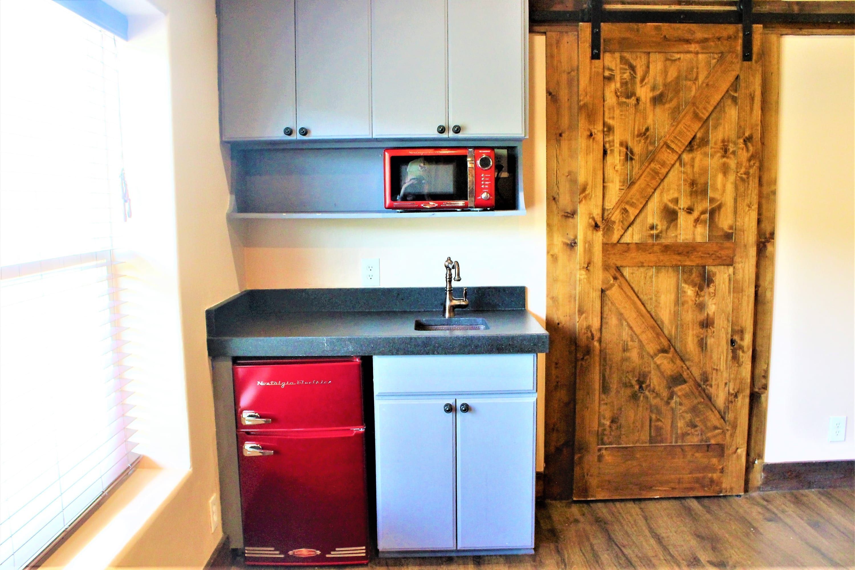 Huis | Privékeuken | Een koelkast, een kookplaat