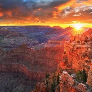 A canyon with a sunset. - Spacious 4BR Home Near Grand Canyon Sleeps 10 (Williams)