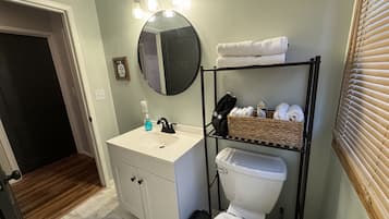 Hair dryer, towels, soap, shampoo