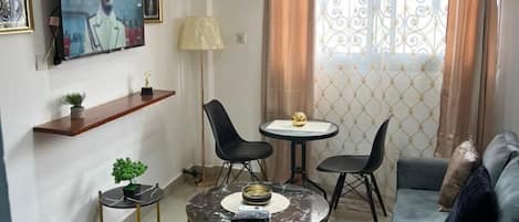 Classic Apartment | Living area | 48-inch Smart TV with satellite channels, Netflix, streaming services