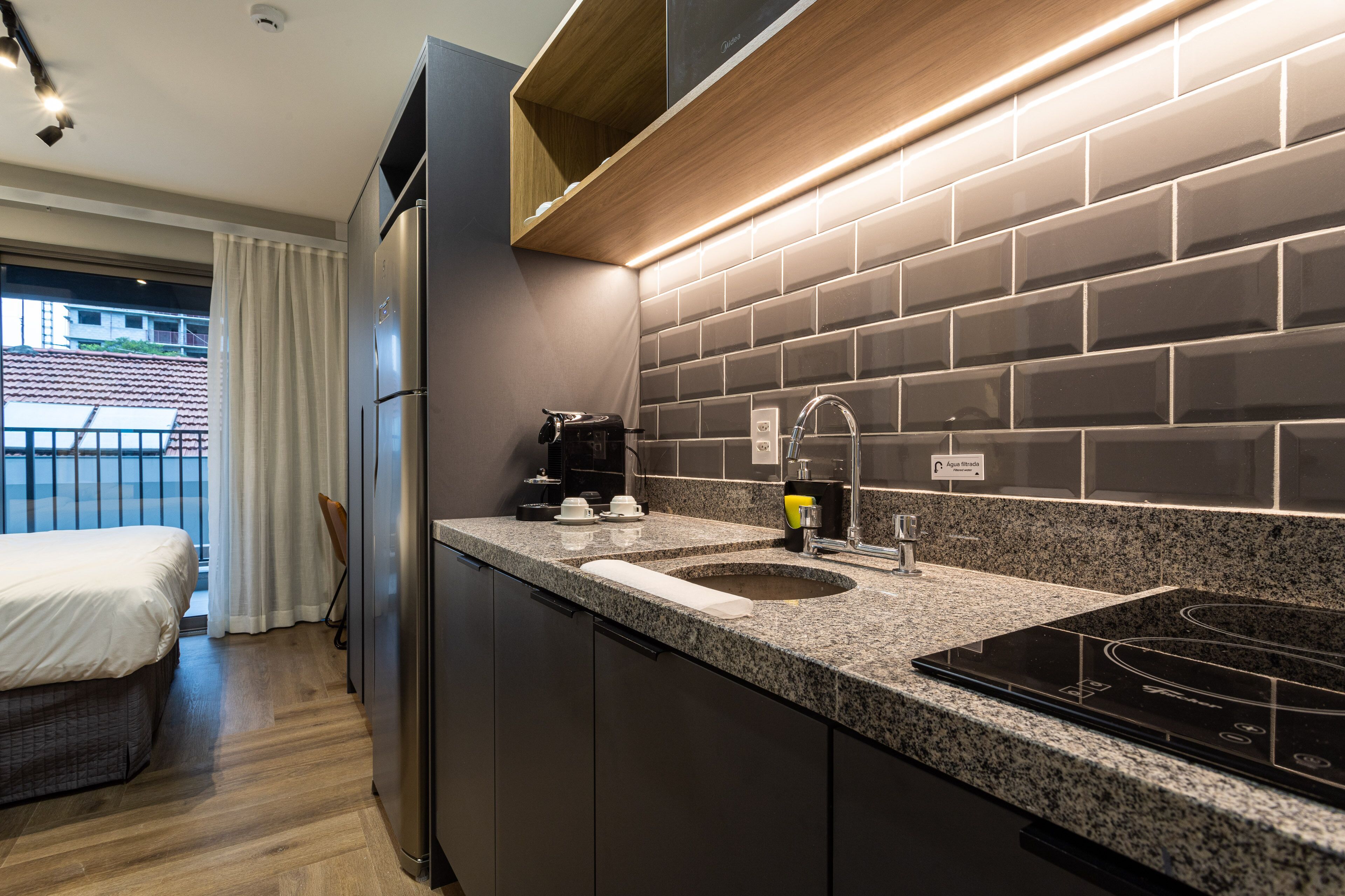 Fridge, microwave, espresso maker, cookware/dishes/utensils