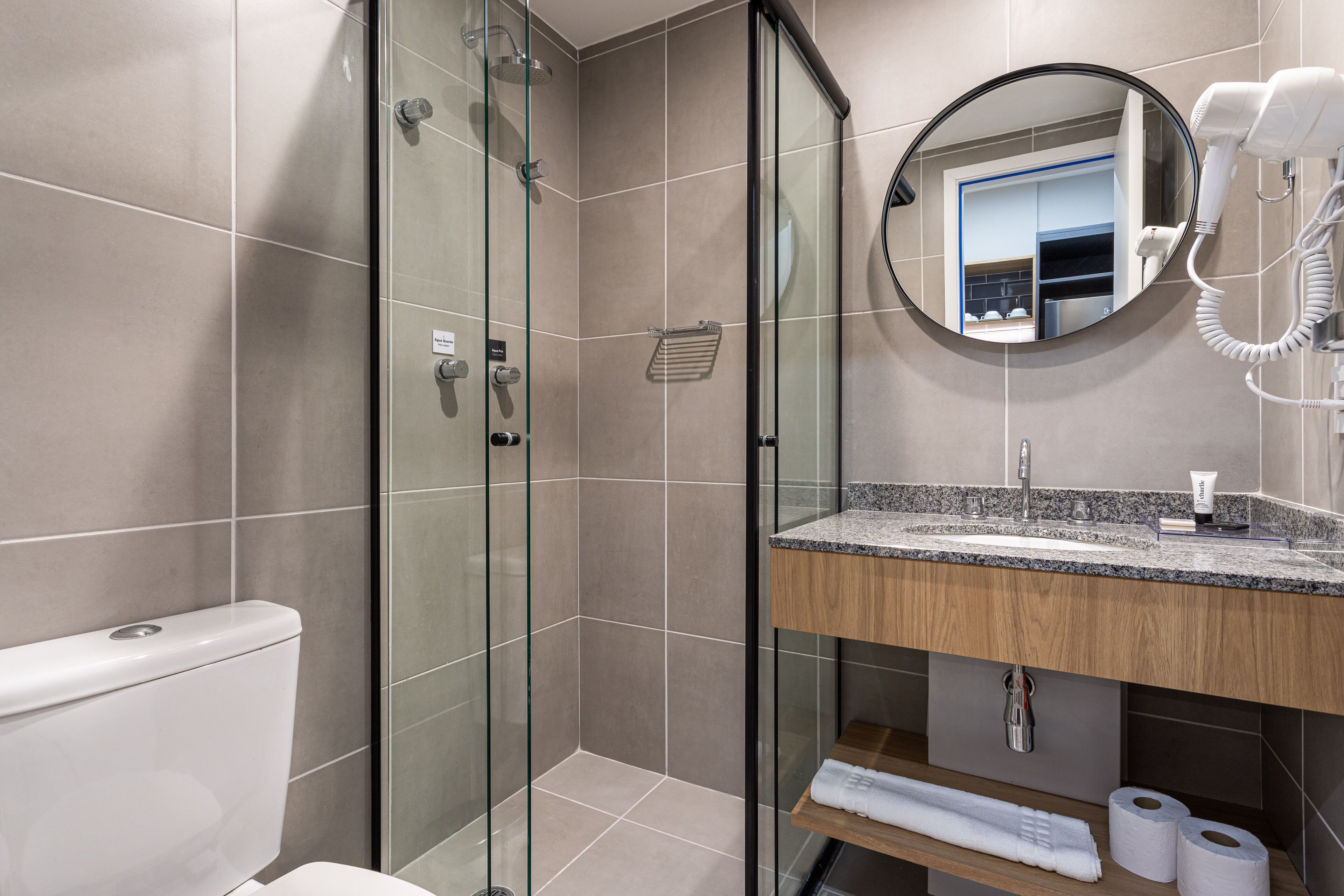 Shower, towels, toilet paper
