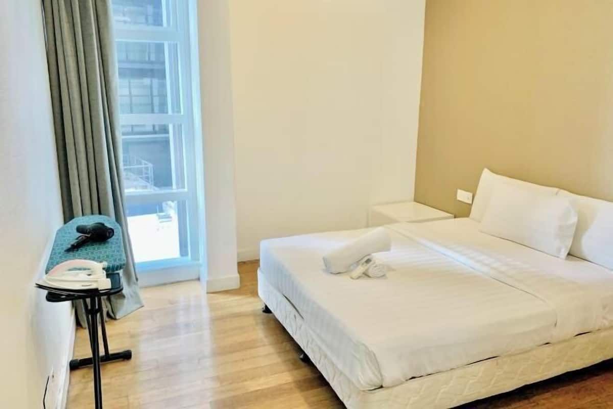 Memory-foam beds, laptop workspace, soundproofing, iron/ironing board