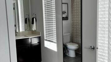 Hair dryer, bidet, towels, toilet paper
