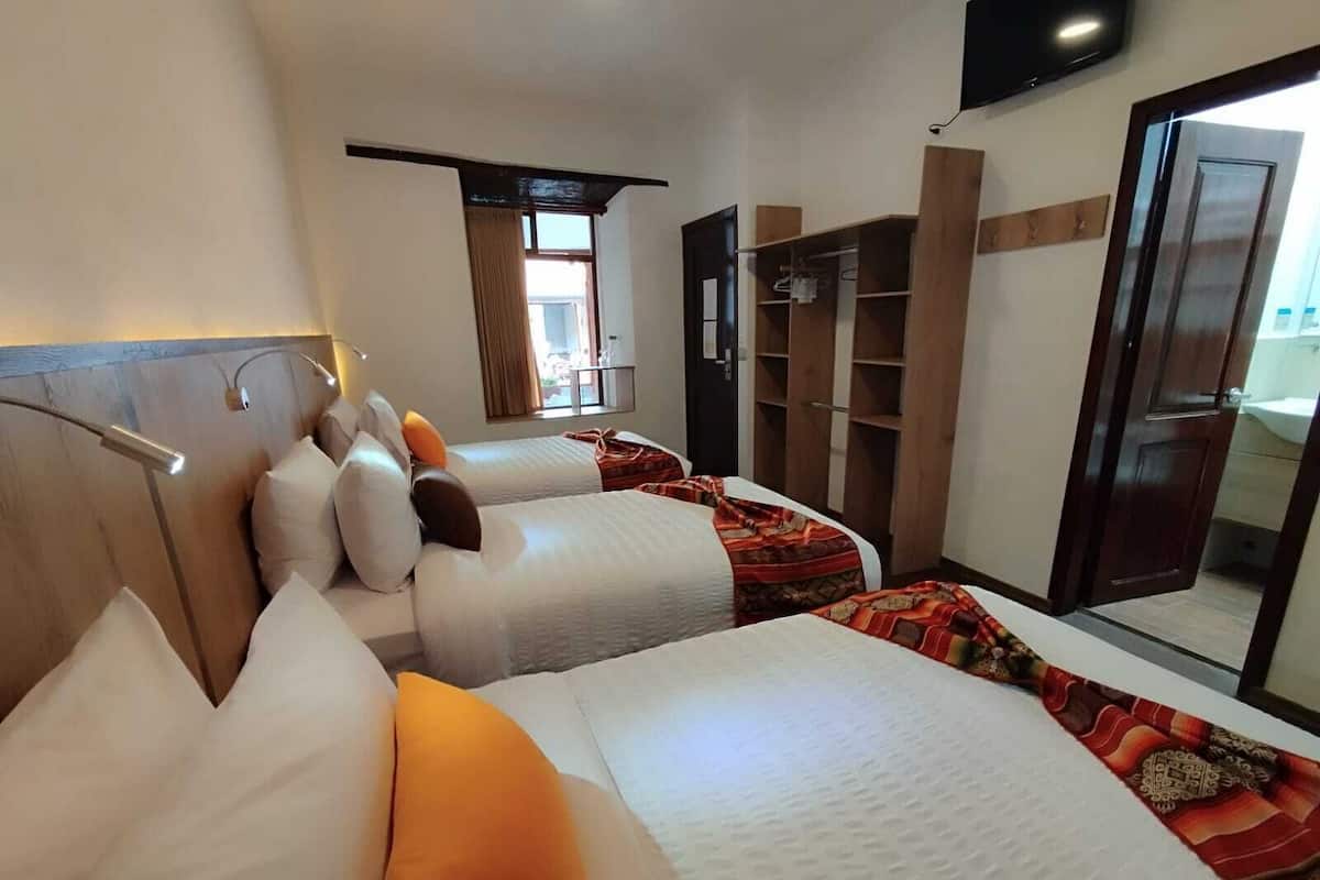 Standard Triple Room, Courtyard View | 1 bilik tidur, peralatan tempat tidur premium, gebar bulu kapas