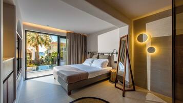 Studio Suite Junior, kolam renang pribadi | Seprai antialergi, tempat tidur Tempur-Pendic, brankas, dan kedap suara