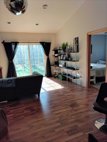 Spacious home with EV charging station two miles from Big Bay Town Park.