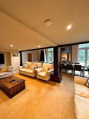 Smart TV, fireplace, foosball, books