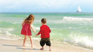 On the beach, sun loungers, beach towels