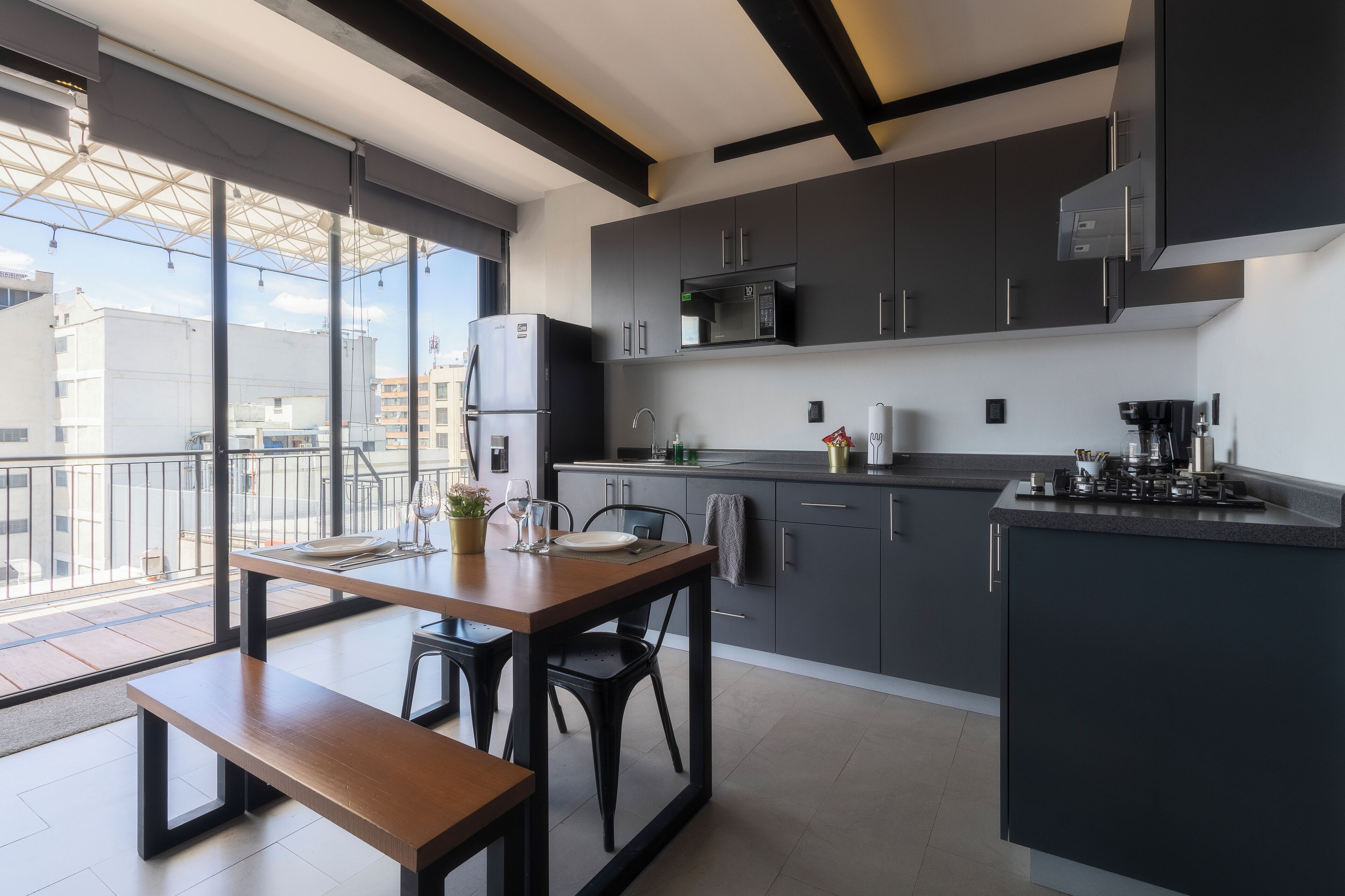 Panomaric Apartment FPH2 | Private kitchen | Full-sized fridge, microwave, stovetop, coffee/tea maker