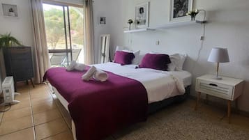 2 habitaciones, tabla de planchar con plancha, cuna de viaje y wifi