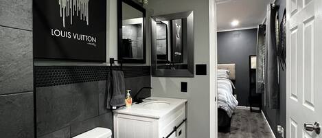 Shower, hair dryer, towels, toilet paper