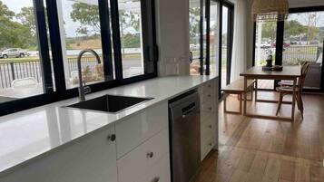 Fridge, coffee/tea maker, cookware/dishes/utensils