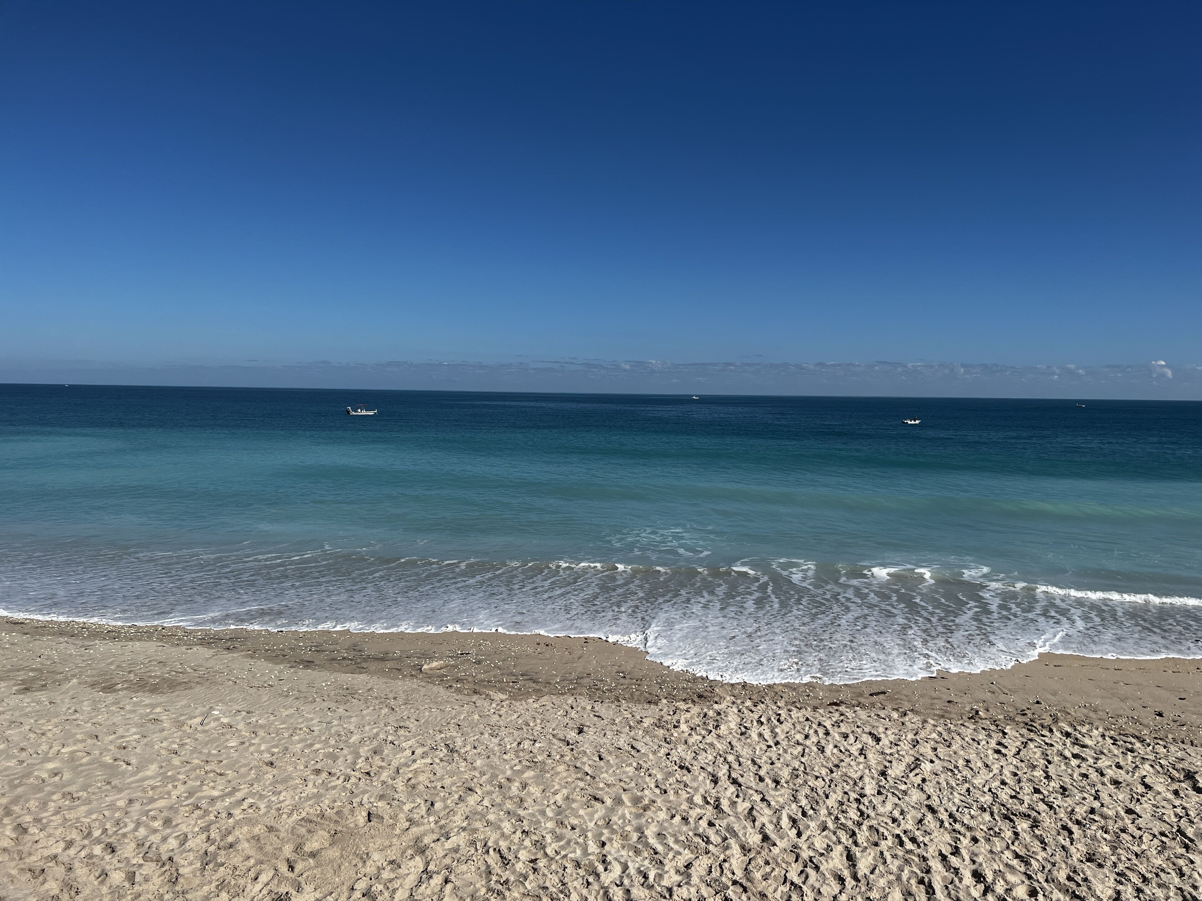On the beach, sun loungers, beach towels